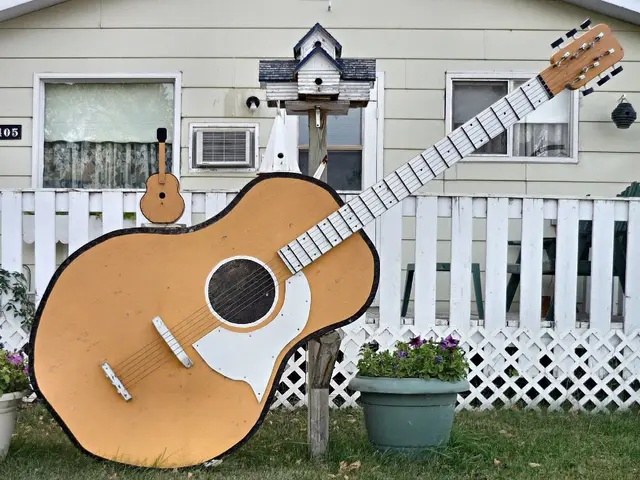 Giant guitar yard ornament